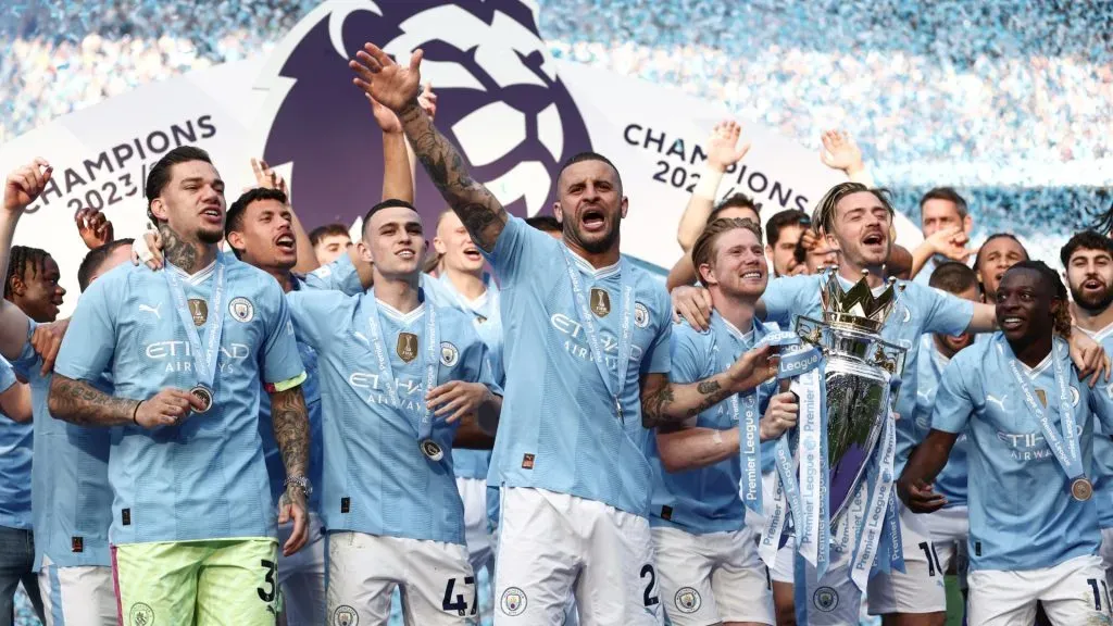 Kyle Walker of Manchester City lifts the Premier League Trophy after their team’s victory during the Premier League match between Manchester City and West Ham United at Etihad Stadium on May 19, 2024 in Manchester, England. (Photo by Naomi Baker/Getty Images)