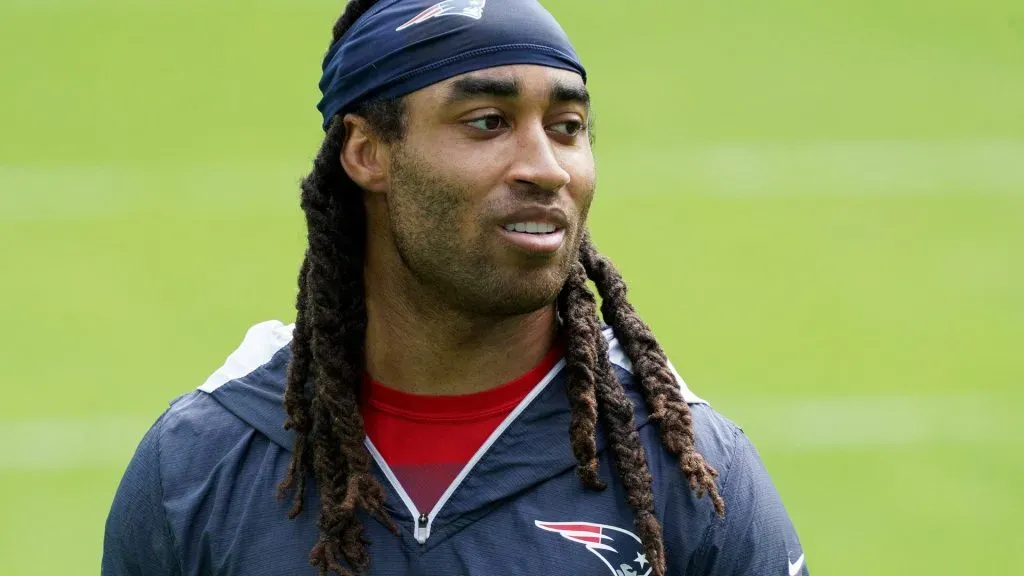 Stephon Gilmore #24 of the New England Patriots looks on prior to the game against the Miami Dolphins at Hard Rock Stadium on December 20, 2020 in Miami Gardens, Florida.