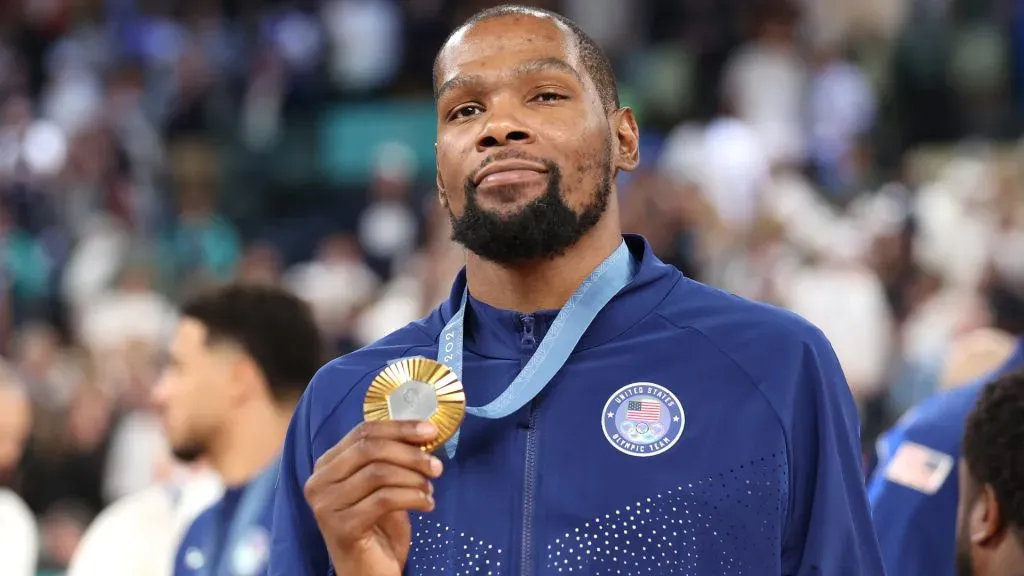 Gold medalist Kevin Durant of Team United States poses for a photo during the Men’s basketball medal ceremony. Ezra Shaw/Getty Images