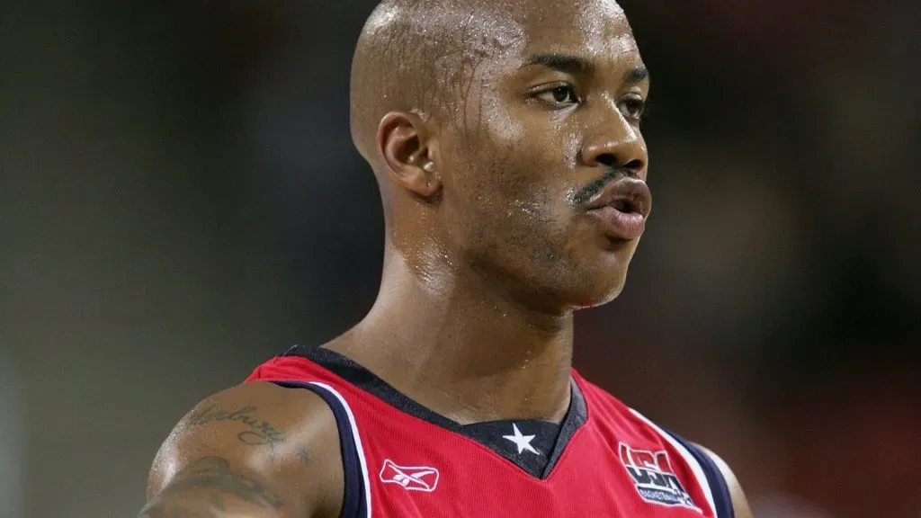 Stephon Marbury #5 of the United States points in the men’s basketball preliminary game against Puerto Rico on August 15, 2004 during the Athens 2004 Summer Olympic Games at the Indoor Arena of the Helliniko Olympic Complex in Athens, Greece. Puerto Rico won 92-73.