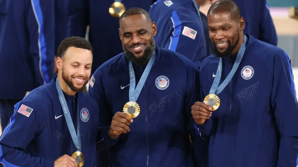 Stephen Curry, LeBron James, and Kevin Durant of Team United States pose for a photo during the Men’s basketball medal ceremony on day fifteen of the Olympic Games Paris 2024 at Bercy Arena on August 10, 2024 in Paris, France.