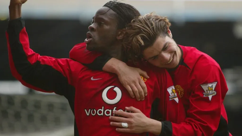 Manchester United goalscorers, Louis Saha (L) and Ronaldo celebrate after Saha had scored the secod goal for United during the FA Barclaycard Premiership match between Birmingham City and Manchester United at St Andrews on April 10, 2004 in Birmingham, England.