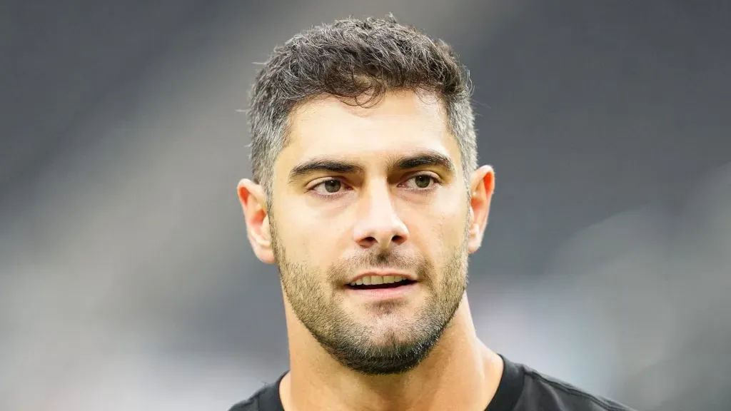 Jimmy Garoppolo looks on before a game