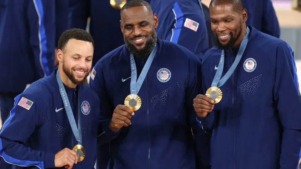 Stephen Curry, LeBron James, and Kevin Durant of Team United States pose for a photo during the Men’s basketball medal ceremony on day fifteen of the Olympic Games Paris 2024 at Bercy Arena on August 10, 2024 in Paris, France.