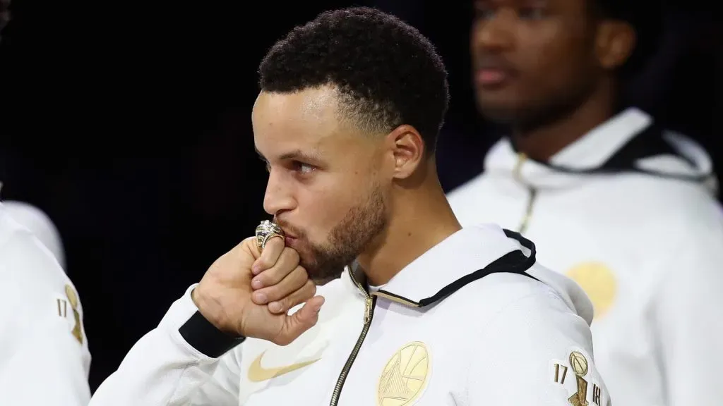 Stephen Curry #30 of the Golden State Warriors kisses his 2017-2018 Championship ring. Ezra Shaw/Getty Images