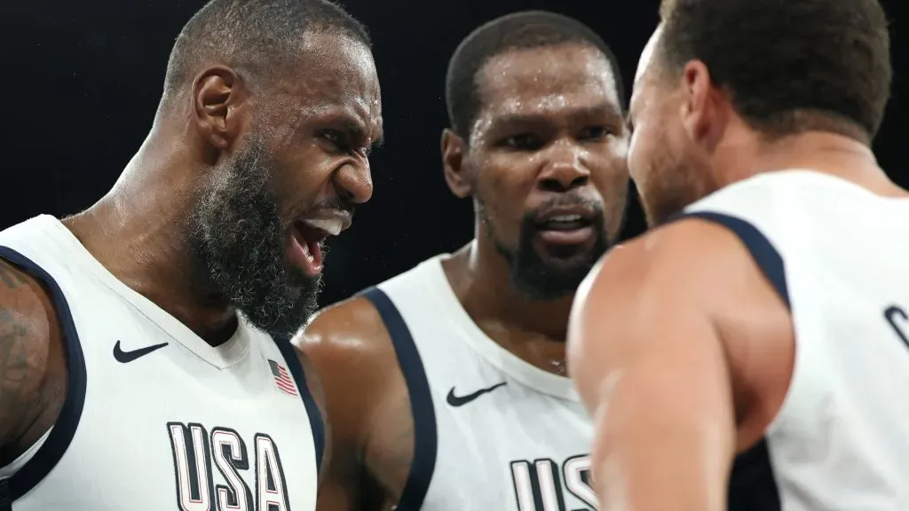 Lebron James #6, Kevin Durant #7, and Stephen Curry #4 of Team United States celebrate after their team’s win against Team Serbia during a Men’s basketball semifinals match between Team United States and Team Serbia on day thirteen of the Olympic Games Paris 2024 at Bercy Arena on August 08, 2024 in Paris, France.