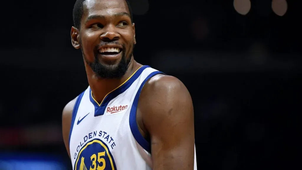 Kevin Durant #35 of the Golden State Warriors smiles at his bench in a 129-110 win over the LA Clippers during Game Six of Round One of the 2019 NBA Playoffs at Staples Center on April 26, 2019 in Los Angeles, California.