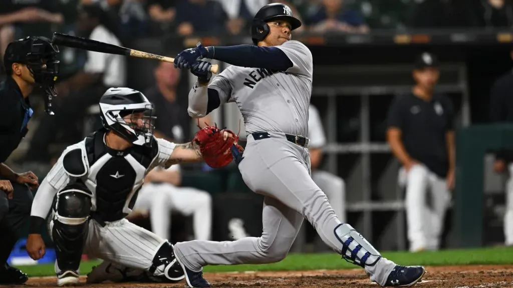 Juan Soto #22 of the New York Yankees hits a solo home run in the seventh inning against the Chicago White Sox at Guaranteed Rate Field on August 13, 2024 in Chicago, Illinois. (Photo by Quinn Harris/Getty Images)