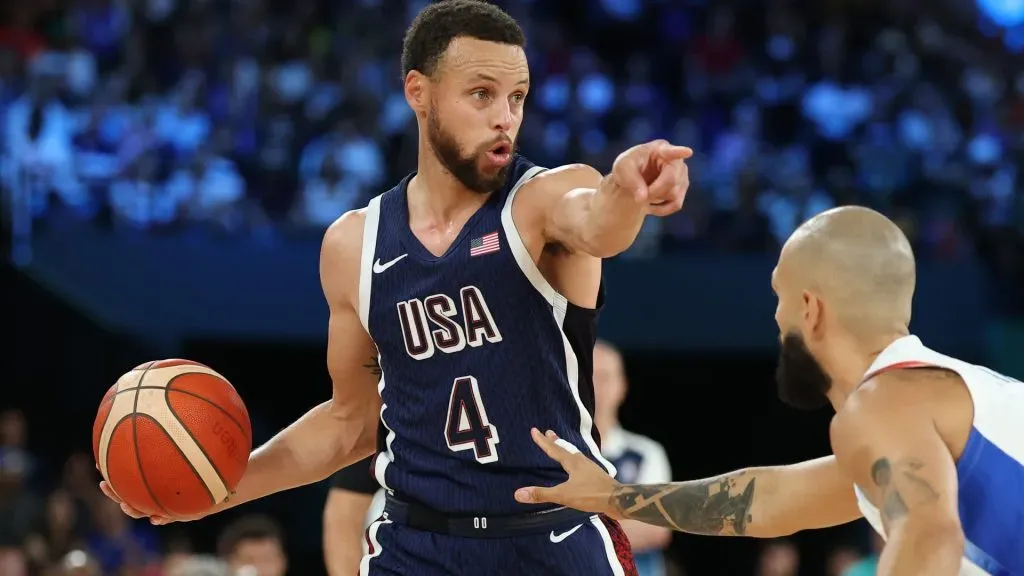 Stephen Curry #4 of Team United States points during the Men’s Gold Medal game between Team France and Team United States on day fifteen of the Olympic Games Paris 2024 at Bercy Arena on August 10, 2024 in Paris, France. (Photo by Gregory Shamus/Getty Images)