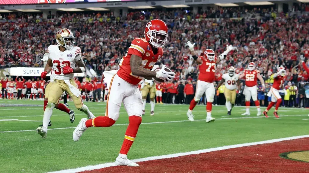 Mecole Hardman Jr. #12 of the Kansas City Chiefs celebrates after catching the game-winning touchdown in overtime to defeat the San Francisco 49ers 25-22 during Super Bowl LVIII at Allegiant Stadium on February 11, 2024 in Las Vegas, Nevada.