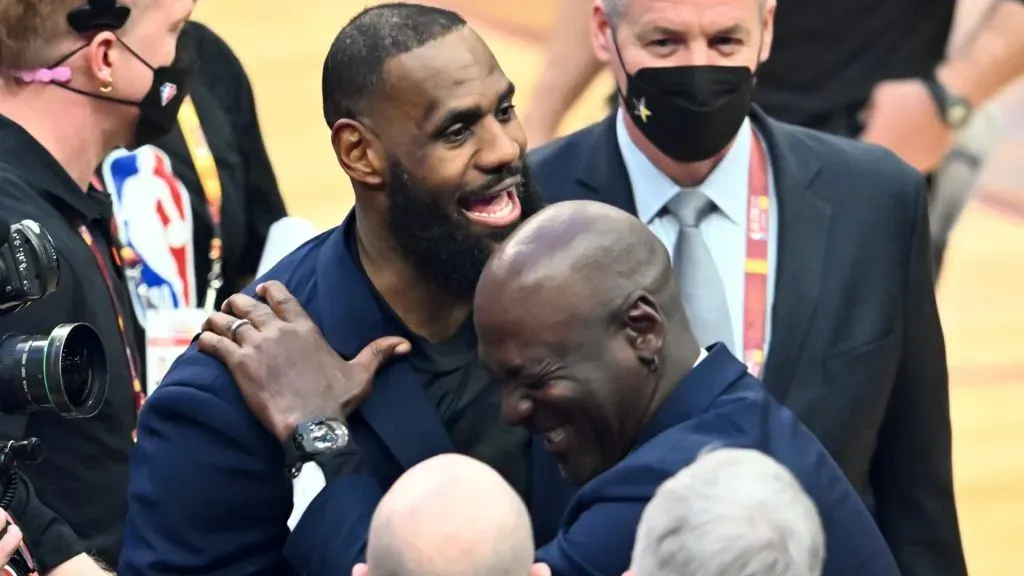 Michael Jordan and LeBron James hug after the presentation of the NBA 75th Anniversary Team during the 2022 NBA All-Star Game at Rocket Mortgage Fieldhouse on February 20, 2022 in Cleveland, Ohio. (Photo by Jason Miller/Getty Images)