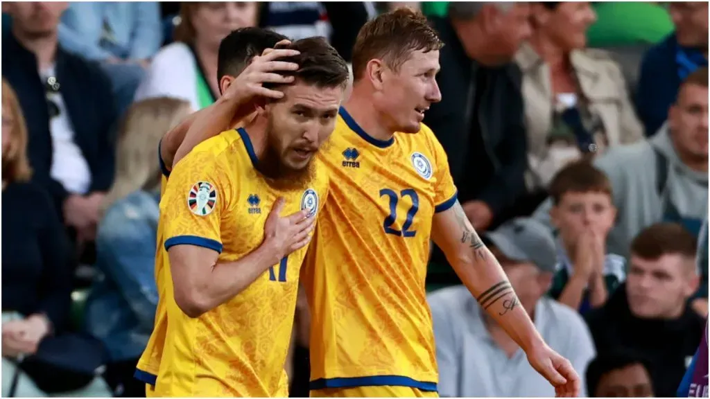 Kazakhstan’s Abat Aimbetov (left) celebrates after scoring –