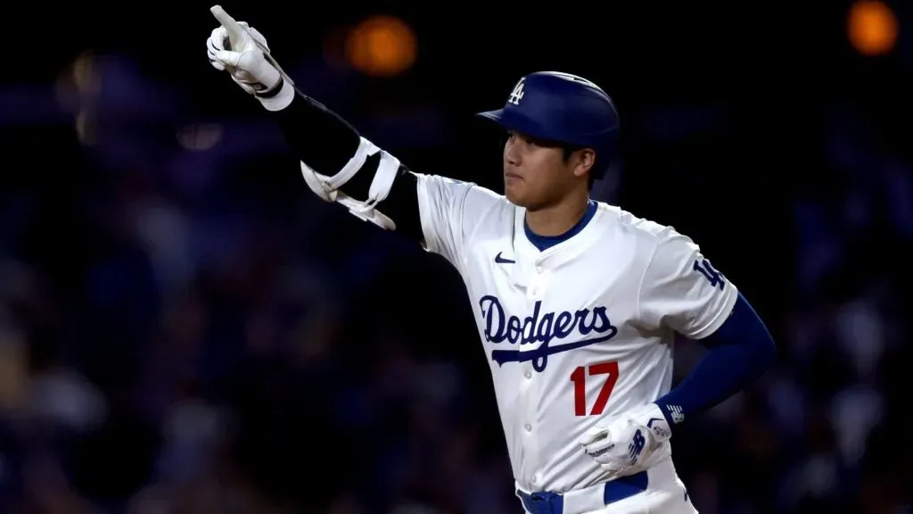 Shohei Ohtani #17 of the Los Angeles Dodgers reacts to his solo home run, his 45th of the season to trail 2-1 to the Cleveland Guardians, during the sixth inning at Dodger Stadium on September 06, 2024 in Los Angeles, California. (Photo by Harry How/Getty Images)