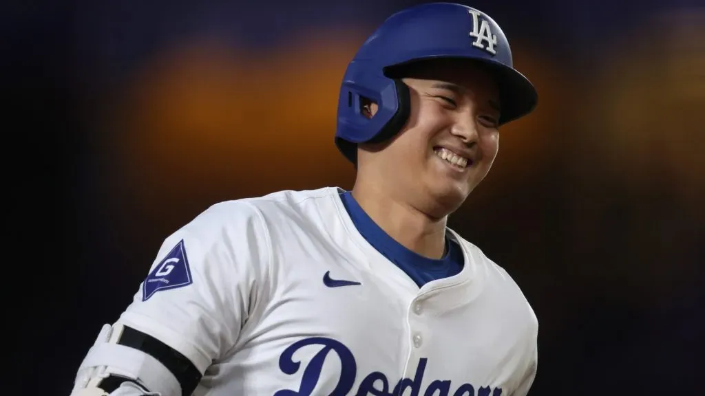 Shohei Ohtani #17 of the Los Angeles Dodgers reacts to his solo home run, his 45th of the season to trail 2-1 to the Cleveland Guardians, during the sixth inning at Dodger Stadium on September 06, 2024 in Los Angeles, California. (Photo by Harry How/Getty Images)