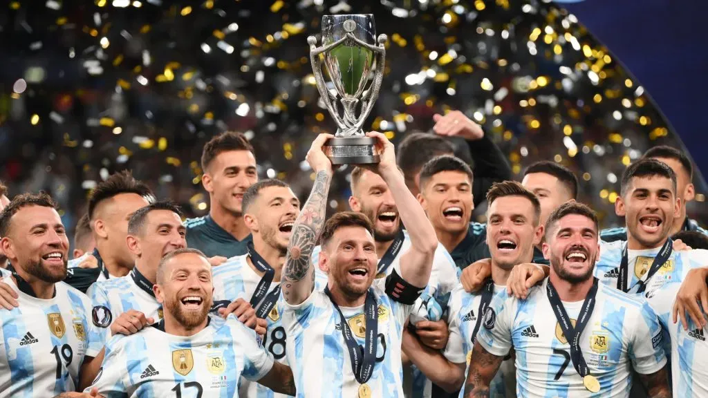 Lionel Messi of Argentina lifts the Finalissima trophy. Shaun Botterill/Getty Images