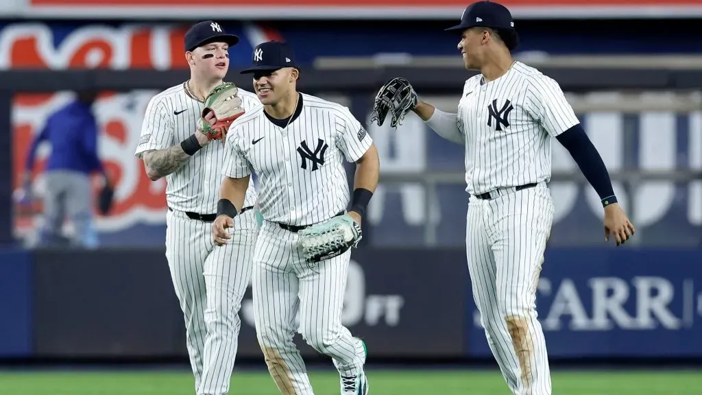 (L-R) Alex Verdugo #24, Jasson Dominguez #89 and Juan Soto #22 of the New York Yankees celebrate after defeating the Kansas City Royals at Yankee Stadium on September 09, 2024 in New York City. (Photo by Jim McIsaac/Getty Images)