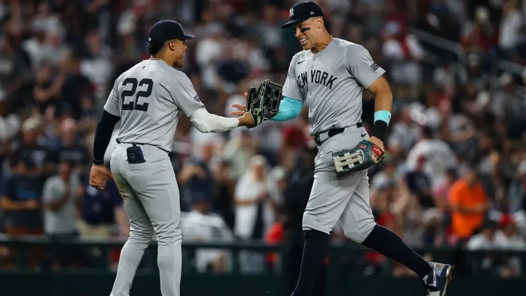 Aaron Judge #99 of the New York Yankees celebrates making a catch at the wall with Juan Soto #22 against the Washington Nationals during the fourth inning at Nationals Park. (Photo by Scott Taetsch/Getty Images)