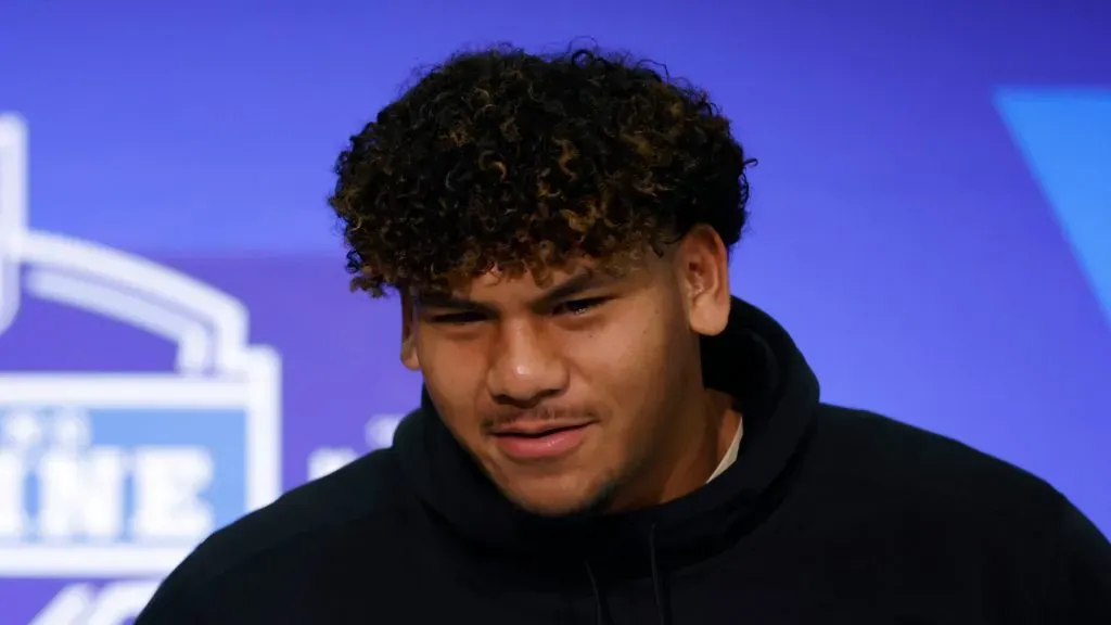 Kingsley Suamataia #OL65 of the Brigham Young Cougars speaks to the media during the 2024 NFL Combine at the Indiana Convention Center on March 02, 2024 in Indianapolis, Indiana.