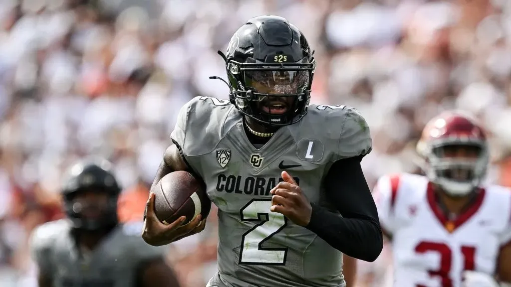 Shedeur Sanders #2 of the Colorado Buffaloes rushes for a touchdown in the second quarter against the USC Trojans at Folsom Field on September 30, 2023 in Boulder, Colorado.