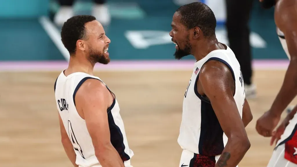 Stephen Curry #4 and Kevin Durant #7 of Team United States celebrate after a basket during a Men’s basketball semifinals match between Team United States and Team Serbia on day thirteen of the Olympic Games Paris 2024 at Bercy Arena. (Photo by Sarah Stier/Getty Images)