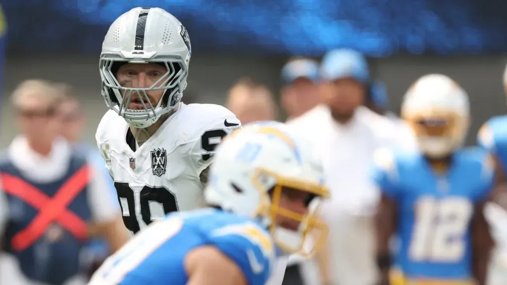 Maxx Crosby #98 of the Las Vegas Raiders lines up watching Justin Herbert #10 of the Los Angeles Chargers during a 22-10 loss to the Chargers at SoFi Stadium on September 08, 2024 in Inglewood, California. (Photo by Harry How/Getty Images)