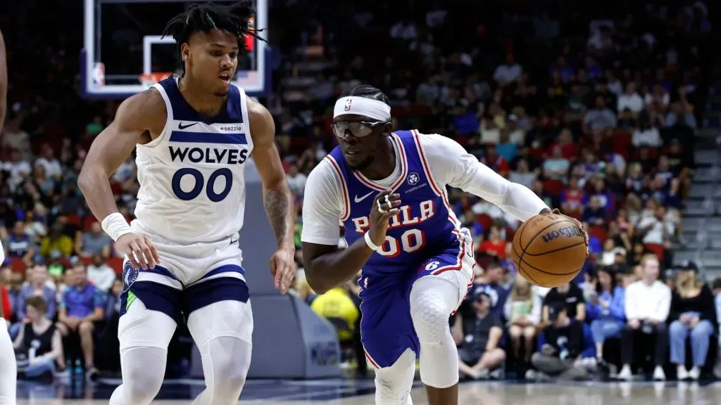 Reggie Jackson #00 of the Philadelphia 76ers drives the ball as Terrence Shannon Jr. #00 of the Minnesota Timberwolves puts pressure on him in the second half of play during a preseason game at Wells Fargo Arena on October 11, 2024, in Des Moines, Iowa. The Minnesota Timberwolves won 121-111 over the Philadelphia 76ers.