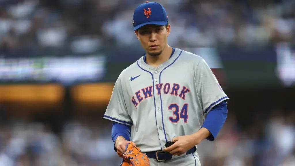 Kodai Senga #34 of the New York Mets walks across the field after being relieved in the second inning against the Los Angeles Dodgers during Game One of the Championship Series at Dodger Stadium on October 13, 2024 in Los Angeles, California. (Photo by Harry How/Getty Images)