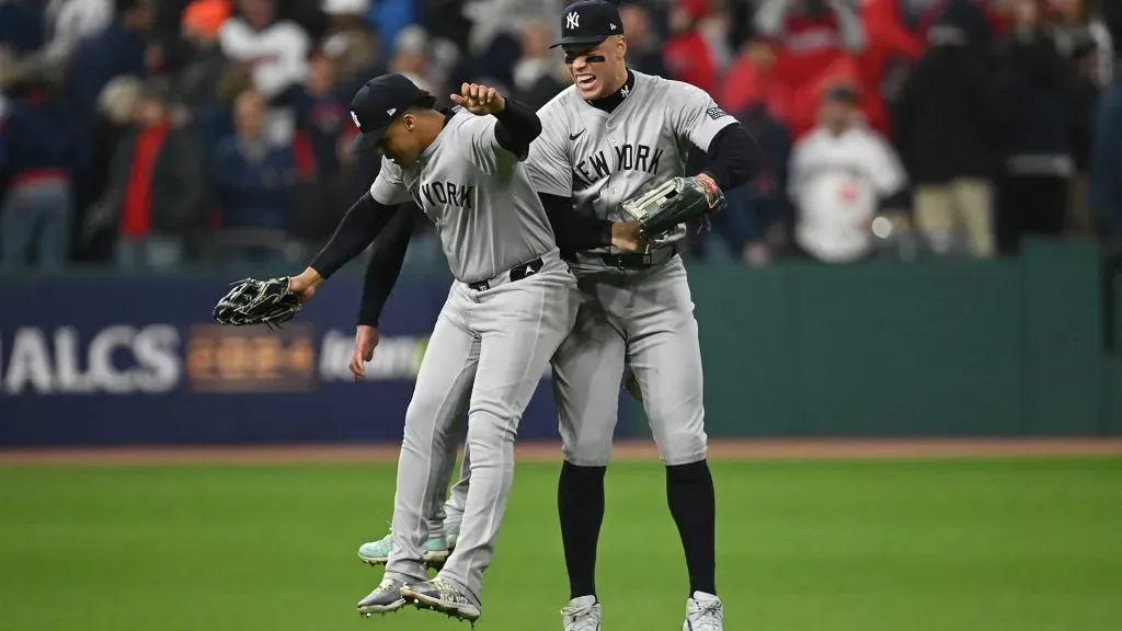 Aaron Judge #99 of the New York Yankees and Juan Soto #22 of the New York Yankees celebrate after the Yankees defeated the Cleveland Guardians, 8-6, in Game Four of the American League Championship Series at Progressive Field on October 18, 2024 in Cleveland, Ohio. (Photo by Nick Cammett/Getty Images)