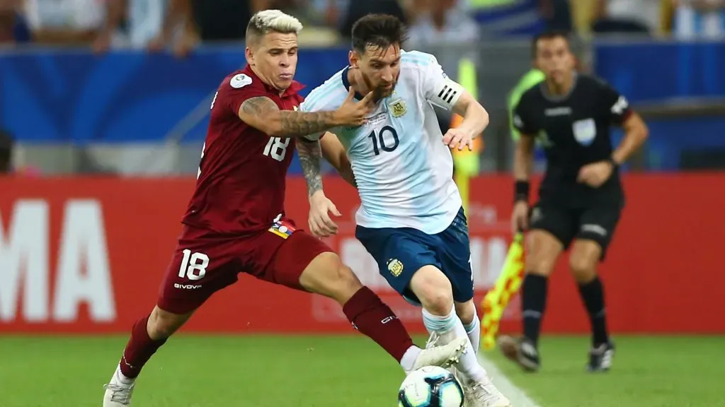 Lionel Messi of Argentina fights for the ball with Yeferson Soteldo of Venezuela during the Copa America Brazil 2019 quarterfinal match between Argentina and Venezuela at Maracana Stadium on June 28, 2019 in Rio de Janeiro, Brazil.