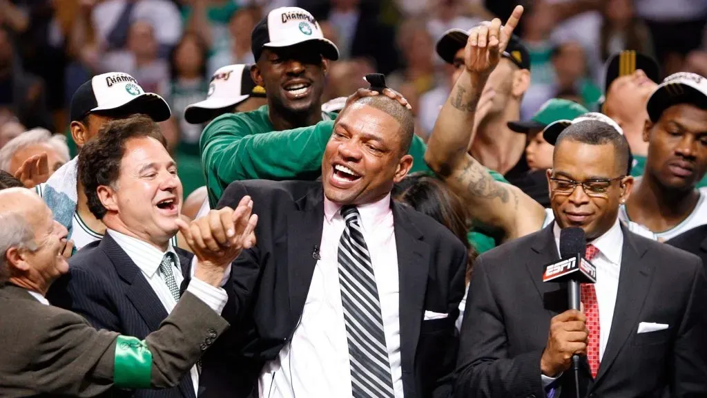 Head coach Doc Rivers of the Boston Celtics celebrates with his team at the end of Game Six of the 2008 NBA Finals against the Los Angeles Lakers on June 17, 2008 at TD Banknorth Garden in Boston, Massachusetts. The Celtics defeated the Lakers 131-92 to win the NBA Championship.