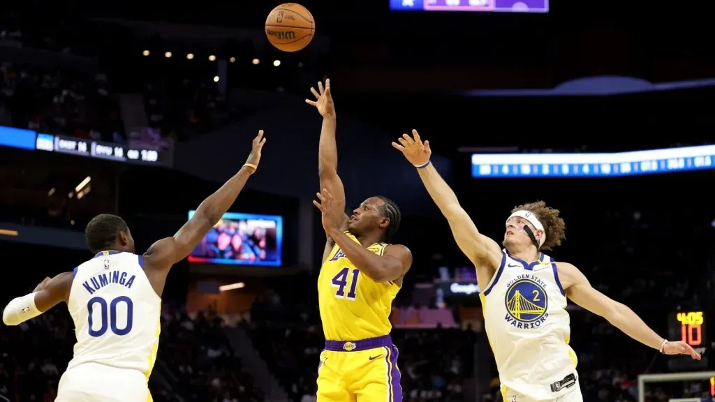 Quincy Olivari #41 of the Los Angeles Lakers shoots over Jonathan Kuminga #00 and Brandin Podziemski #2 of the Golden State Warriors during the first half of their preseason game at Chase Center on October 18, 2024 in San Francisco, California. 