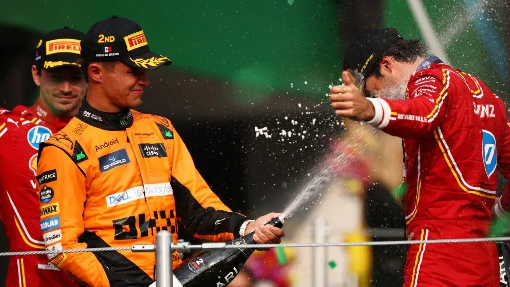 Race winner Carlos Sainz of Spain and Ferrari and Second placed Lando Norris of Great Britain and McLaren celebrate on the podium (Jared C. Tilton/Getty Images)