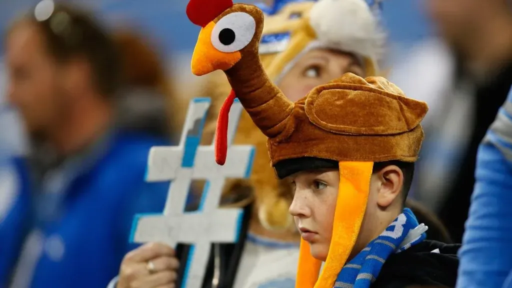 A young fan with a turkey hat looks on during the Thanksgiving day game between the Detroit Lions and Chicago Bears at Ford Field on November 27, 2014. (Source: Gregory Shamus/Getty Images)