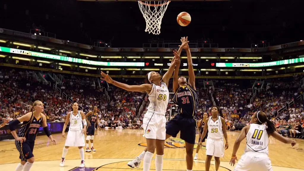 Jessica Moore #31 of the Indiana Fever puts up a shot over Tangela Smith #50 of the Phoenix Mercury during the WNBA game at US Airways Center on August 8, 2009. (Source: Christian Petersen/Getty Images)