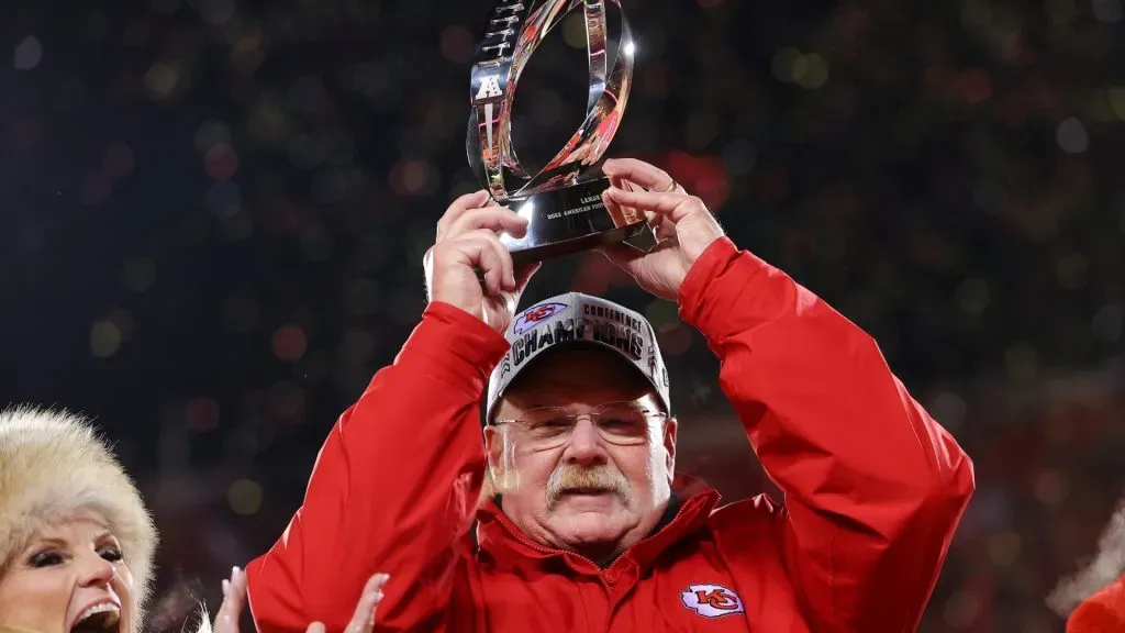 Head coach Andy Reid of the Kansas City Chiefs holds up the Lamar Hunt Trophy after defeating the Cincinnati Bengals 23-20 in the AFC Championship Game at GEHA Field in 2023. (Source: Kevin C. Cox/Getty Images)