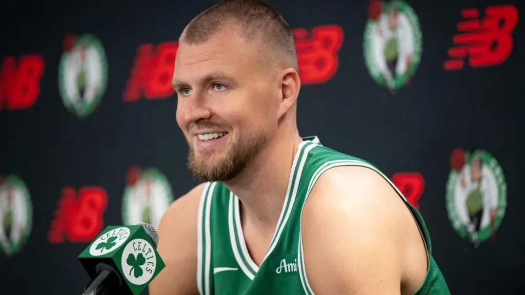 Kristaps Porzingis #8 of the Boston Celtics speaks to the media during Boston Celtics Media Day