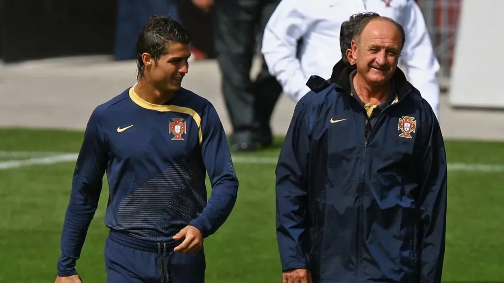 Cristiano Ronaldo (L) talks with head coach Luiz Felipe Scolari during the Portugal training session at Stade La Maladiere on June 14, 2008 in Neuchatel, Switzerland.