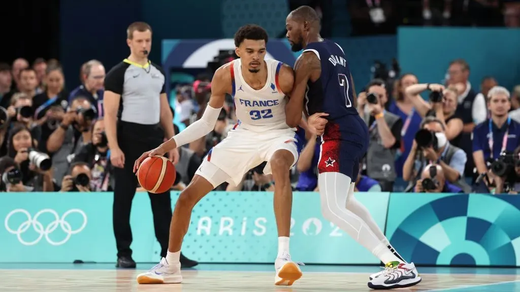 Victor Wembanyama #32 of Team France dribbles against Kevin Durant #7 of Team United States during the Men’s Gold Medal game between Team France and Team United States in the 2024 Paris Olympic Games.