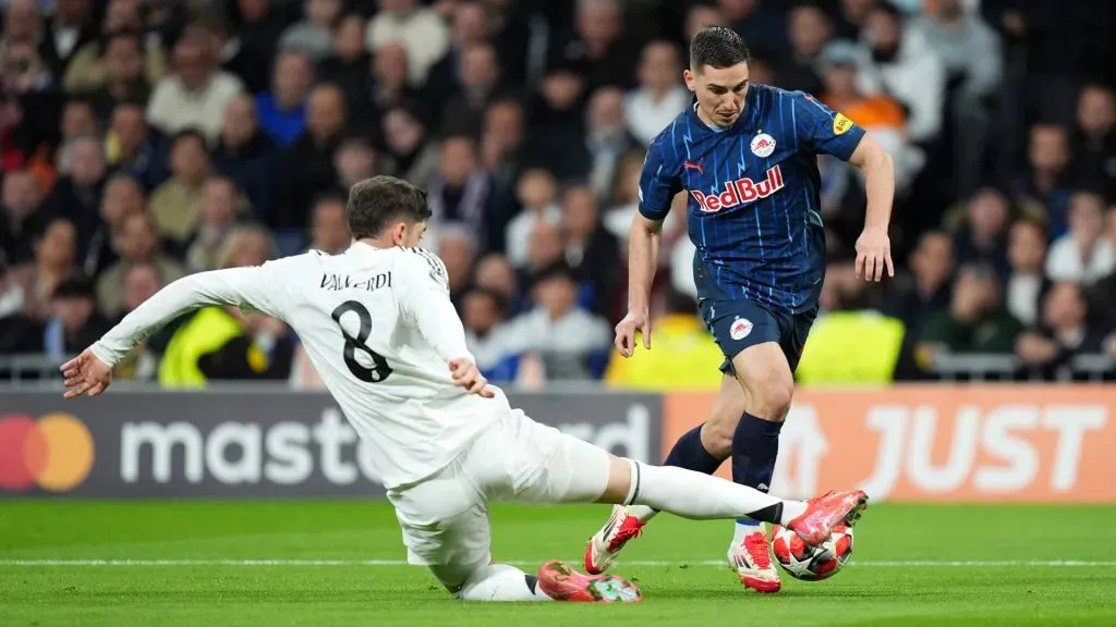 Oscar Gloukh of FC Salzburg is challenged by Federico Valverde of Real Madrid during a UEFA Champions League match. (Angel Martinez/Getty Images)