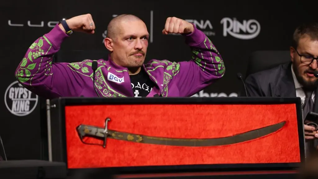 Oleksandr Usyk speaks to the media while sitting in front of a ‘Ukraine Wow: Mazepa’s Saber’ in a post-fight after the IBF, IBO, WBA, WBC and WBO Undisputed World Heavyweight titles’ fight between Oleksandr Usyk and Tyson Fury as part of Oleksandr Usyk v Tyson Fury 2. (Photo by Richard Pelham/Getty Images)