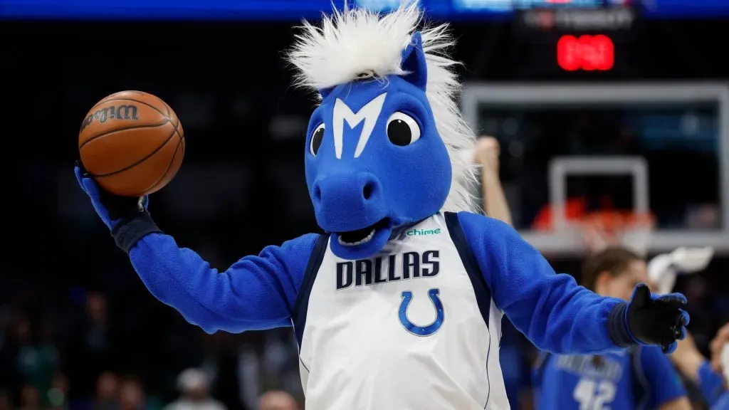 Dallas Mavericks mascot Champ holds a basketball before the game against the Houston Rockets at American Airlines Center on December 29, 2022. (Source: Tim Heitman/Getty Images)