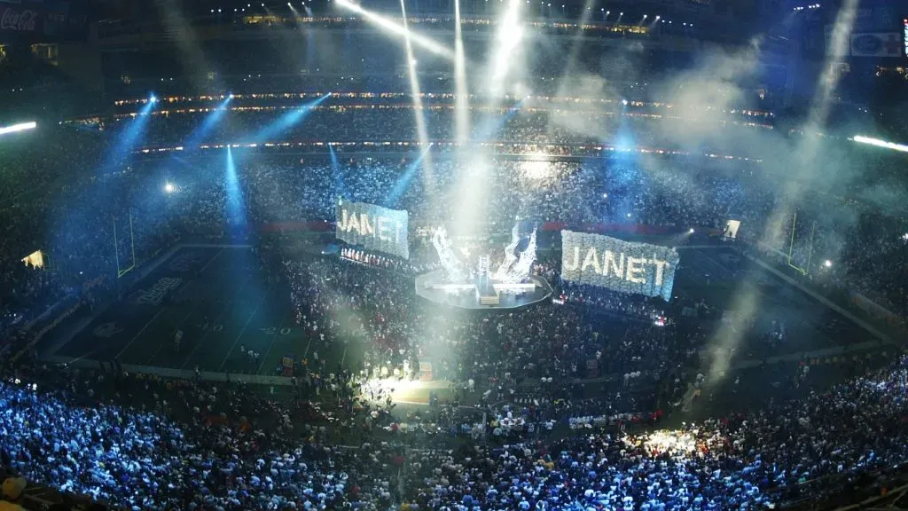Janet Jackson performs during the halftime show at Super Bowl XXXVIII between the New England Patriots and the Carolina Panthers at Reliant Stadium on February 1, 2004 in Houston, Texas. (Source: Ronald Martinez/Getty Images)