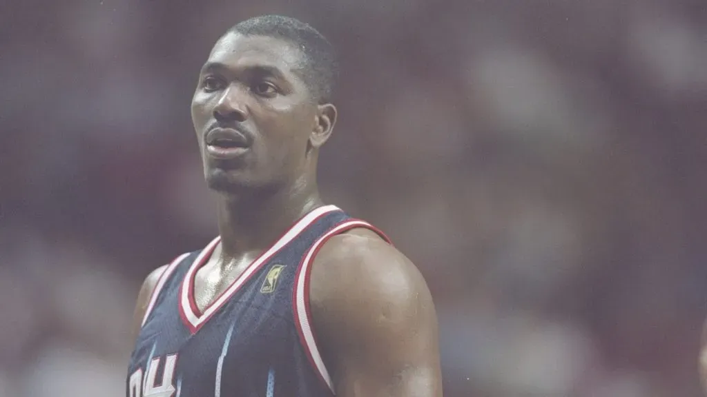 Center Hakeem Olajuwon of the Houston Rockets looks on during a game against the Orlando Magic.
