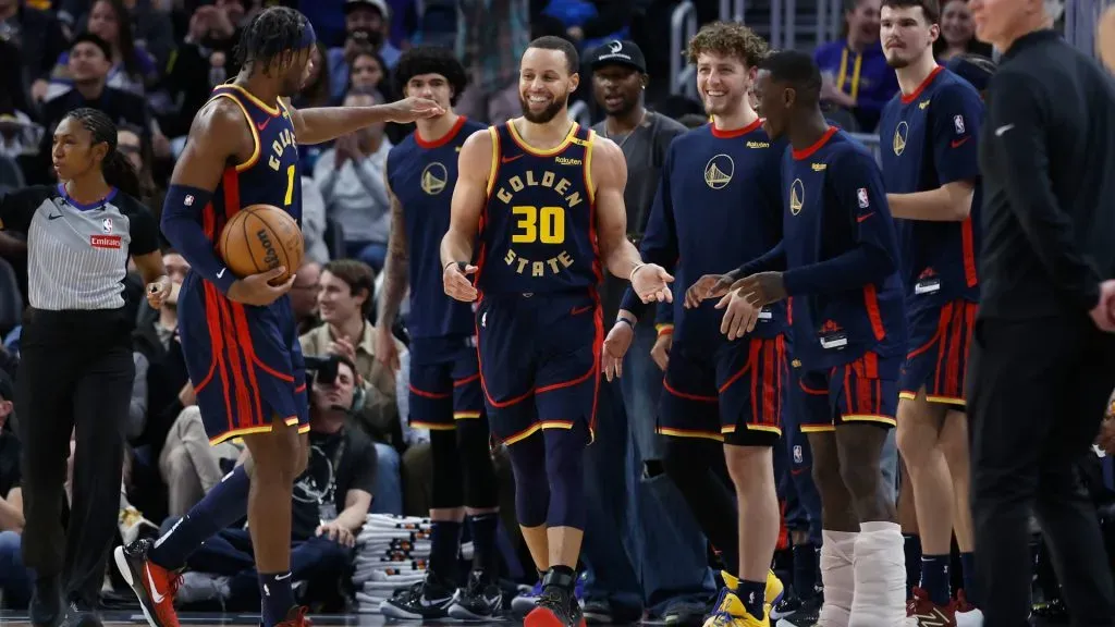 Stephen Curry #30 of the Golden State Warriors reacts with teammates after a play in the third quarter against the Oklahoma City Thunder at Chase Center.