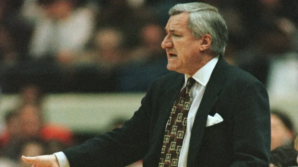 Dean Smith of the North Carolina Tar Heels in action during the Tar Heels game versus the New Orleans Privateers in the first round of the East regionals of the NCAA Tournament in 1996. (Source: Getty Images)