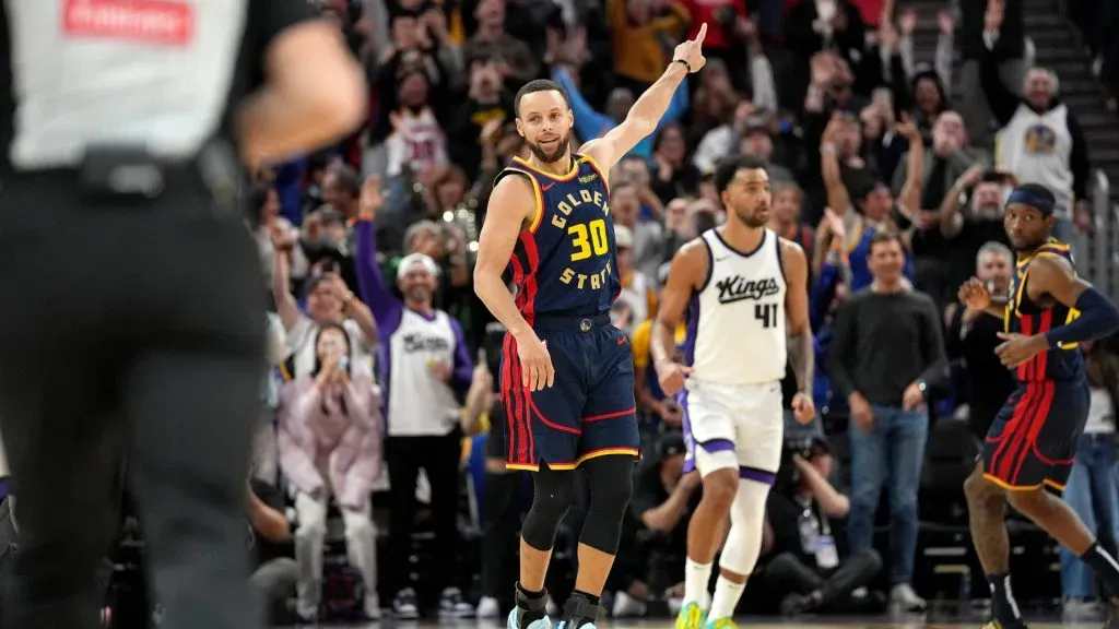 Stephen Curry #30 of the Golden State Warriors reacts after making his 4000th career three-pointer against the Sacramento Kings. (Thearon W. Henderson/Getty Images)