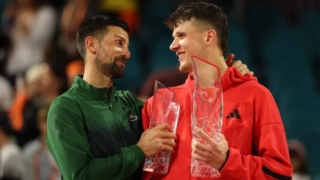 Djokovic and Mensik during the 2025 Miami Open trophy ceremony (Al Bello/Getty Images)