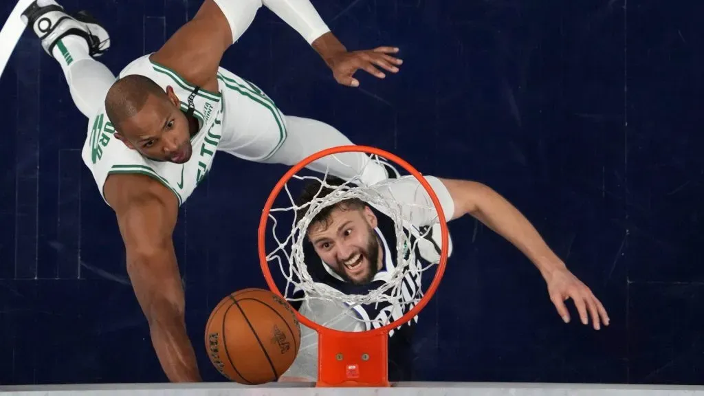 Maxi Kleber #42 of the Dallas Mavericks shoots the ball against Al Horford #42 of the Boston Celtics in Game Four of the 2024 NBA Finals. (Source: Julio Cortez – Pool/Getty Images)