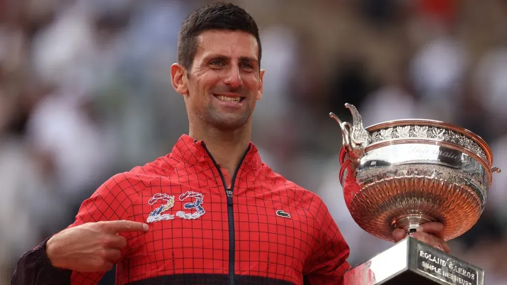 Novak Djokovic of Serbia celebrates with the winners trophy after victory against Casper Ruud of Norway in the 2023 Roland Garros final. (Julian Finney/Getty Images)