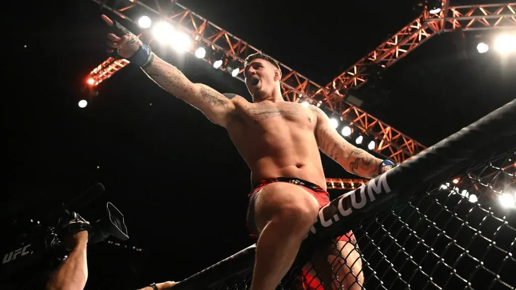 Tom Aspinall celebrates after defeating Alexander Volkov during UFC Fight Night: Volkov v Aspinall at the The O2 Arena on March 19, 2022. (Source: Justin Setterfield/Getty Images)